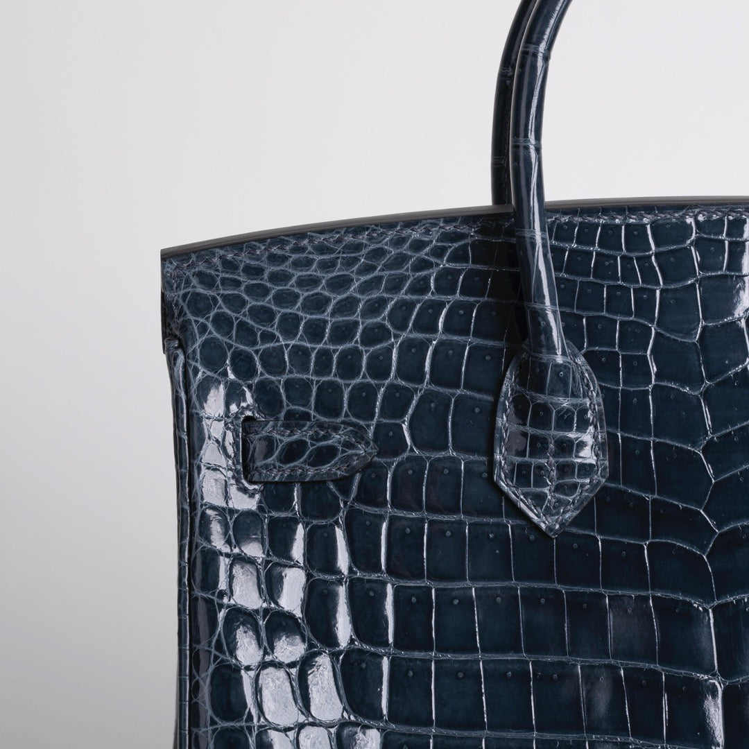 BIRKIN 25 SHINY NILOTICUS CROCODILE LEATHER BLEU TEMPETE WITH PALLADIUM HARDWARE (PHW)